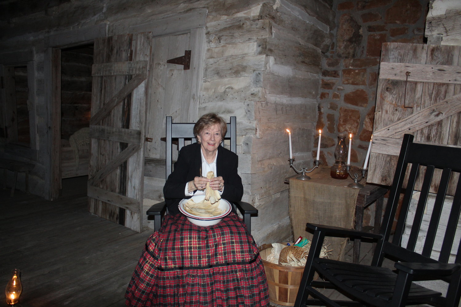 Vicki Frenzel waits to greet visitors to the "Stars in the Village" exhibit at Pioneer Village in 2019. The exhibit returns Saturday, Dec. 4, as well as Friday-Saturday, Dec. 10-11.